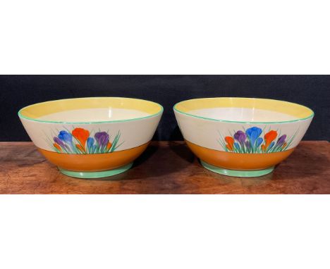 A pair of Clarice Cliff Crocus pattern bowls, hand painted in bright colours, 22.5cm diameter, printed Royal Staffordshire an