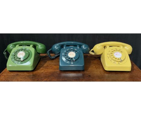 A 1960's G.P.O. rotary dial telephone, model 706L AEG67/2A, in teal; others similar, model 706L PXA 65/2A, in green; model 70
