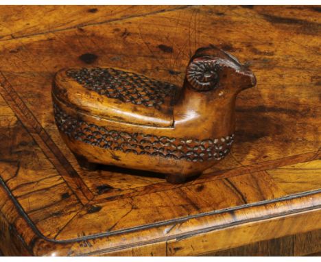 A 19th century Continental novelty snuff box, as a ram, chip-carved, pivoting cover, 11cm long 