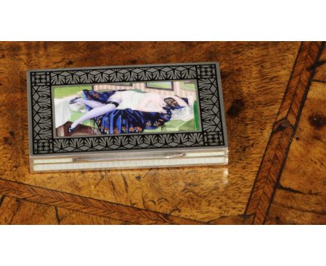 An early 20th century Continental silver and enamel rectangular erotic snuff box, hinged cover decorated with a scantily clad