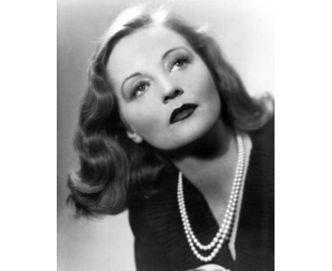 Tallulah Bankhead - A two strand graduated pearl necklace, the clasp stamped '14K' for 14ct, set with a cushion cut citrine, 