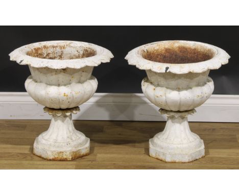 A pair of 19th century cast iron garden urns, lotus rims, octagonal bases, 42cm high, 42cm wide 