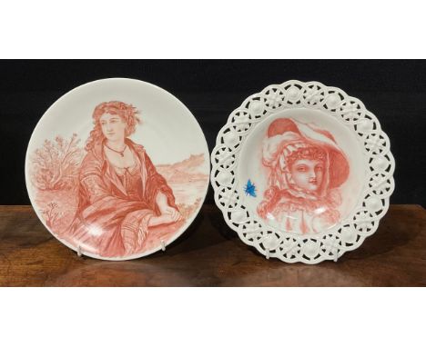 A Minton's China shaped circular plate, the field painted in red sepia with the portrait of a young woman of fashion with mot