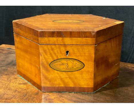 A George III satinwood navette shaped tea caddy, the cover and front inlaid with oval shell and harewood patera, within mahog