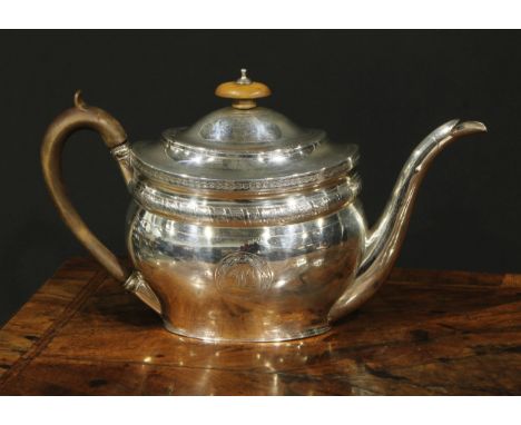 A George III silver oval teapot, hinged domed cover, bright-cut and wrigglework engraved, fruitwood finial and handle, 27.5cm