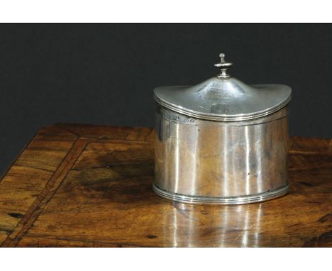 A George V silver oval oval tea caddy, hinged cover with urnular finial, 9cm wide, Stokes &amp; Ireland, Chester 1928, 154g 