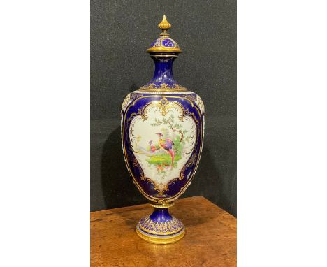 A Royal Worcester ovoid pedestal vase and cover, in the manner of George Johnson, painted with a cartouche of fanciful birds 