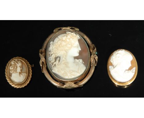 A 19th century cameo brooch, bust portrait Flora, yellow metal mount, 6.5cm x 5.5cm overall, others smaller, one stamped 9ct 