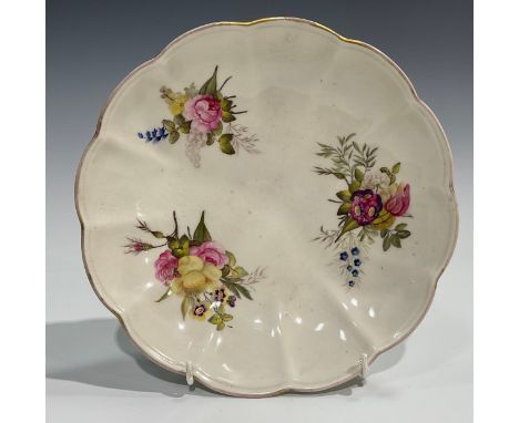 An early 19th century Derby lobed circular dish, outside decorated,&nbsp; painted with bunches of English summer flowers, pos