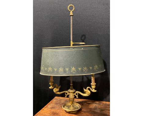 A French gilt bronze bouillote lamp, in the Empire taste, the branches cast as swans, posted handle, tole ware shade, dished 