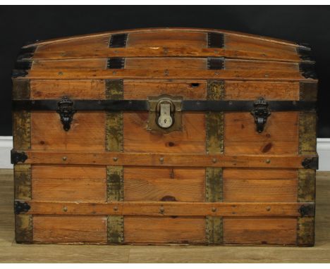 An early 20th century metal-bound pine dome top steamer trunk, 63.5cm high, 93cm wide, 52cm deep 