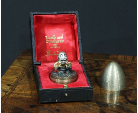 Stuart Devlin (1931 - 2018) - an Elizabeth II silver-gilt Surprise Egg, Humpty Dumpty, textured overall, 7.5cm long, London 1