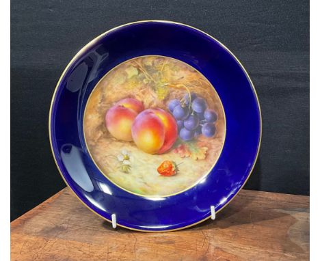 A Royal Worcester circular plate, painted by R. Sebright, signed, the field with peaches, grapes and strawberry, gilt lined c