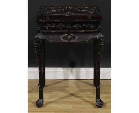 A Chinese hardwood envelope card table, hinged quadripartite top enclosing a playing surface and counter wells, above four fr