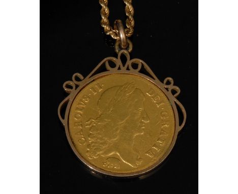 A Charles II 1664 gold 2 guinea, first laureate head facing dexter, Elephant below bust, CAROLVS. II. DEI. GRATIA. Verso, Cro