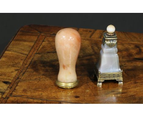 A 19th century polished alabaster desk seal, blood agate matrix, 7cm long; a silver-gilt coloured metal mounted agate seal or