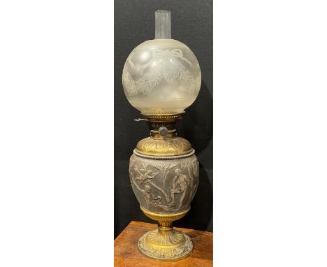 A 19th century silvered and gilt-metal ovoid table oil lamp, in the Grand Tour taste, chased after the Antique with figures a