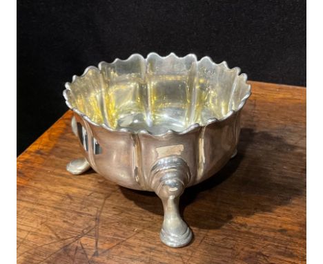 A silver bonbon dish, as a stylised flowerhead, three splayed feet, 4.7cm high, R &amp; S Garrard, London 1849 