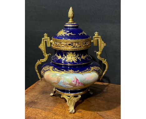 A French porcelain gilt-metal mounted ovoid potpourri vase and cover, in the Louis XVI taste, painted by Simon, signed, with 