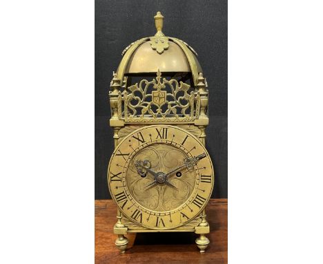 A 19th century brass lantern clock, 15cm chapter ring engraved with Roman numerals, twin winding holes, eight-day fusee movem