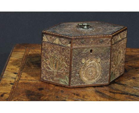 A George III rolled paper quill work lozenge shaped tea caddy, hinged cover with brass axehead handle, outlined with barber p