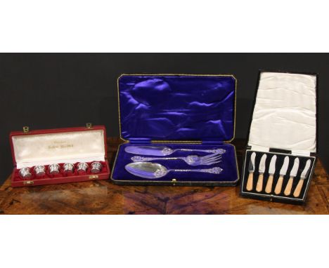 An early 20th century E.P.N.S three piece patisserie serving set, c.1920, cased; a set of six French silver plated novelty pe