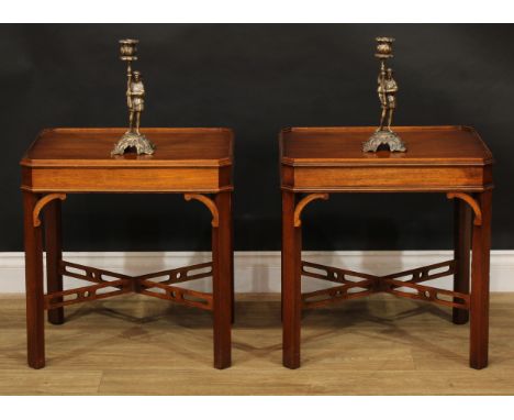 A pair of George III style mahogany canted rectangular lamp tables, in the Chinese Chippendale taste, each with shallow galle
