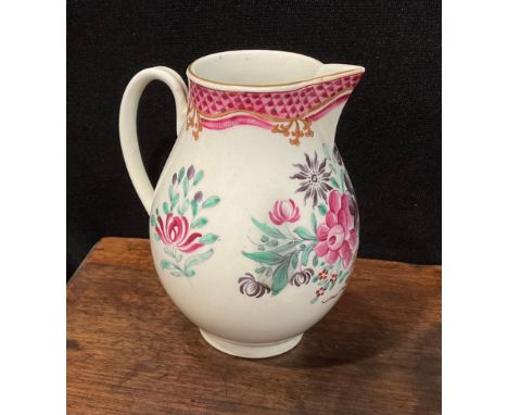 A Worcester Famille Rose sparrow beak jug, scale pink border, scroll handle, 10cm high, c.1770 