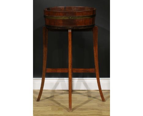 A coopered oak bloom trough or jardiniere on stand, mahogany stand, the planter stamped 7J4J153, 86.5cm high, 63.5cm wide, 52