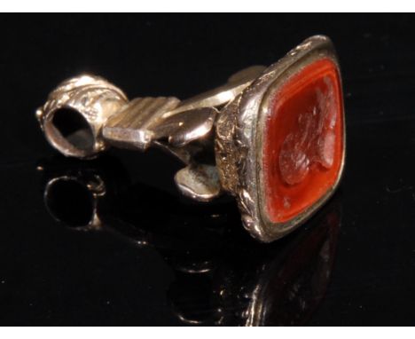 A 19th century gilt metal fob seal, the carnelian matrix carved with a portrait bust of Horatio Nelson, 1st Viscount Nelson, 