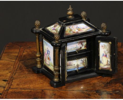 An Austrian enamel and gilt metal mounted ebonised miniature table cabinet, pagoda top with acanthus bud finials, above a pai