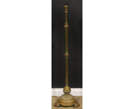 Interior Design - a brass floor lamp, reeded-effect column, stepped circular base stamped HINKS, kidney shaped feet, 125.5cm 
