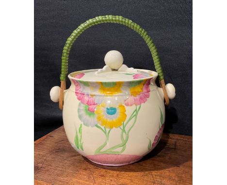 A Clarice Cliff Bizarre Pink Pearl pattern biscuit barrel and cover, hand painted with pink, yellow and green trailing flower