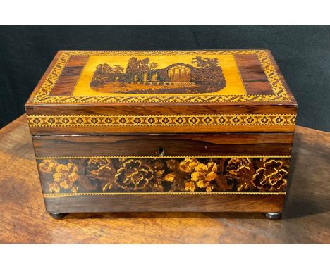 A Victorian rectangular rosewood and Tonbridge Ware tea caddy, the cover decorated with Abbey ruins, the sides with a broad g