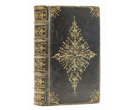 Binding.- The Book of Common Prayer, ruled throughout in red, contemporary black morocco, gilt, covers with large centre-piec