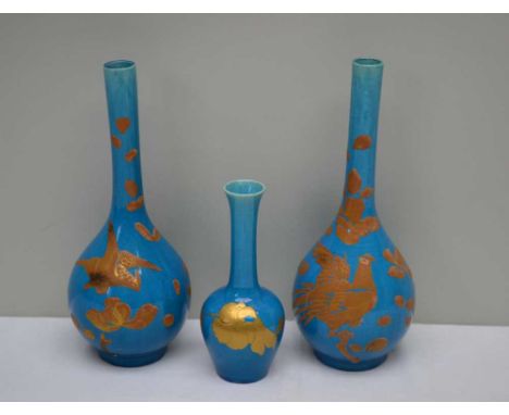 A PAIR OF JAPANESE TEAR DROP FORM BLUE GLAZED CERAMIC VASES, with gilded decoration, 24cm high, together with a smaller simil