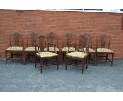 A SET OF SIX 19TH CENTURY MAHOGANY SHIELD BACK SINGLE DINING CHAIRS, together with a PAIR OF OPEN ARM CARVERS, each with tape