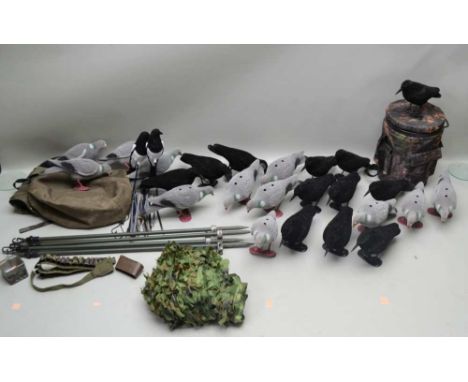 A COLLECTION OF SHOOTING ACCESSORIES &amp; DECOYS; 12 pigeons, 12 crows, 2 magpie, together with camouflage netting, pole and