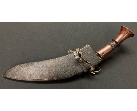 Nepalese Gurkha Kukri Knife with single edged blade 320mm in length. No makers markings. Brass and carved wooden grip. Overal