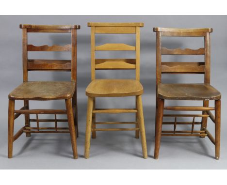 Three chapel chairs, one with carved inscription, another with label “C. D. Wilkinson, St. Lawrence”.