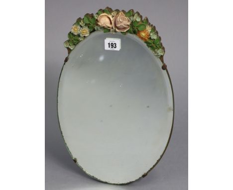 A barbola-style oval dressing table mirror on an easel support, 15½” x 9¾”; together with a cast-iron cobblers last; various 