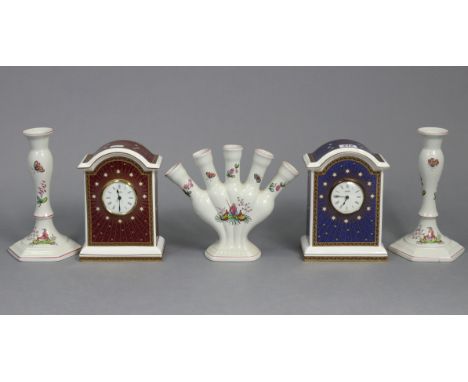Two Spode’s bone china Limited Edition “Millennium Celebration Clocks”, 8” high; a ditto pair of “Pearl River” candlesticks, 