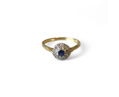 18ct Yellow Gold Diamond And Sapphire Ring  Marked: "18ct"  Tested as 18ct Gold  Ring Size: R 1/2 Approximately  Weight: 2,8g