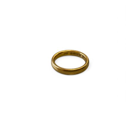A 22ct yellow gold band ring size J, 3mm width, weight 4.7g.&nbsp;