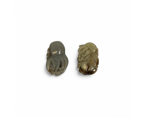 Two Chinese carved jade pendants, likely Qing dynasty, one carved as a citron, the other a citron and a peach with a hoofed a