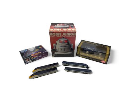 Assorted toys, comprising a 1980s Tandy Robie Junior Remote Command Intelligent Robot, a Playmates Start Trek Alien Series Ca