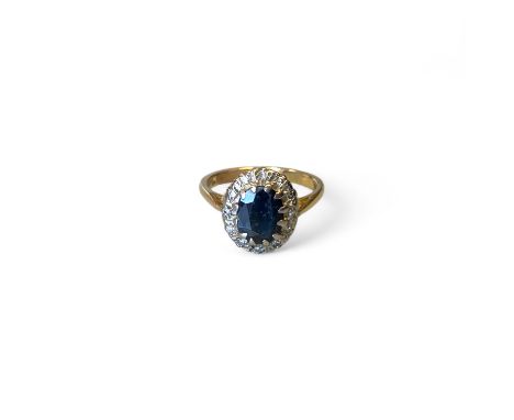 Unmarked 18ct Yellow Gold Tested Diamond And Sapphire Ring  Ring Size: Q 1/2 approximately  Weight: 5.6g  Heavy wear to sapph