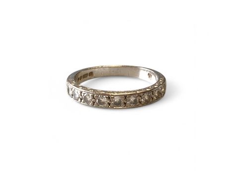 18ct White Gold Diamond Half Eternity Ring With 9 Diamonds   Ring size: L Approximately  Weight: 3.1g.