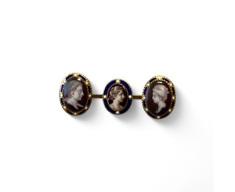 A gilt metal brooch set with 3 enamel portrait miniatures of high quality overall measures 44mm by 9mm by 15mm high, largest 