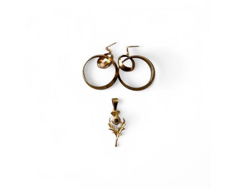 A 9ct yellow gold Thistle pendant, 37mm high, 1.9g and a pair of gilt metal double hoop earrings, weight 4.56g (3).  (Earring